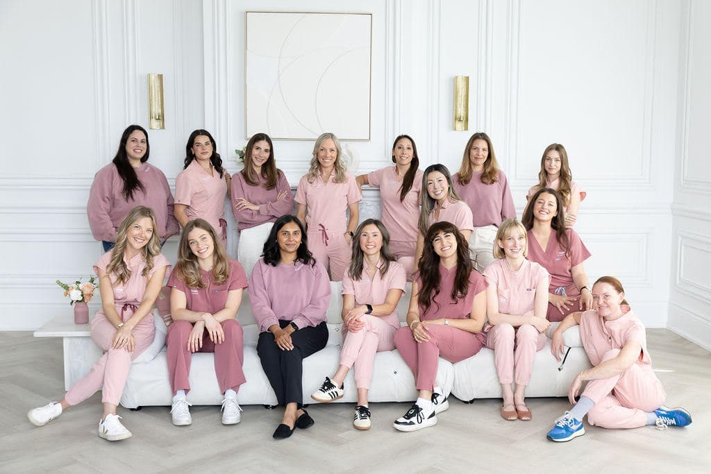 The Flourish × Twig wellness team in Toronto, in their signature pink scrubs.